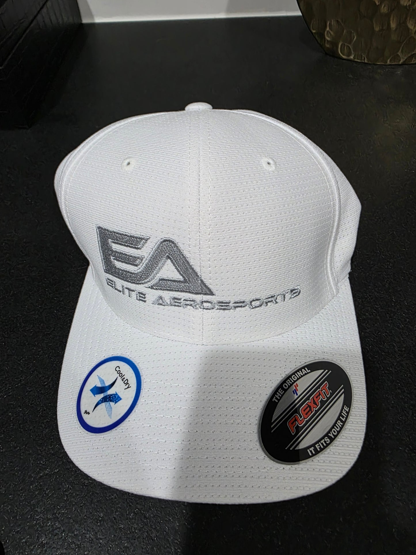 EA Cool and Dry Flexfit cap. One size fits all.