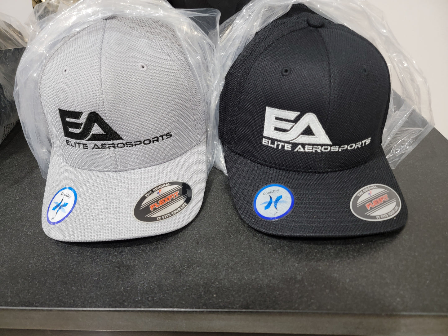 EA Cool and Dry Flexfit cap.  One size fits all.